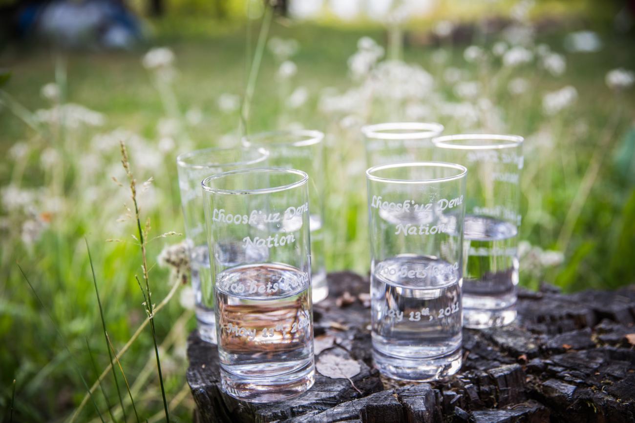 Glasses engraved with 'Too bets`huna,' meaning ‘We live by water’ 